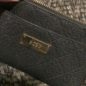 BCBG black clutch/wristlet